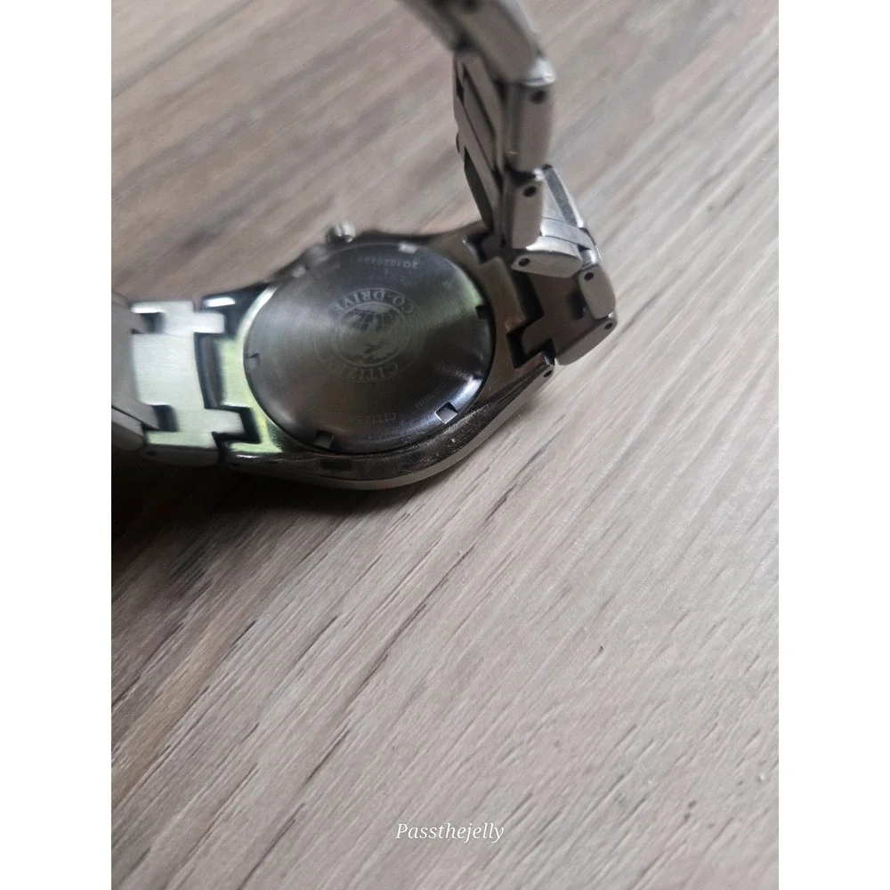 Citizen Watch Mens Eco-Drive Titanium WR100 Black Dial Date Bracelet Field Watch